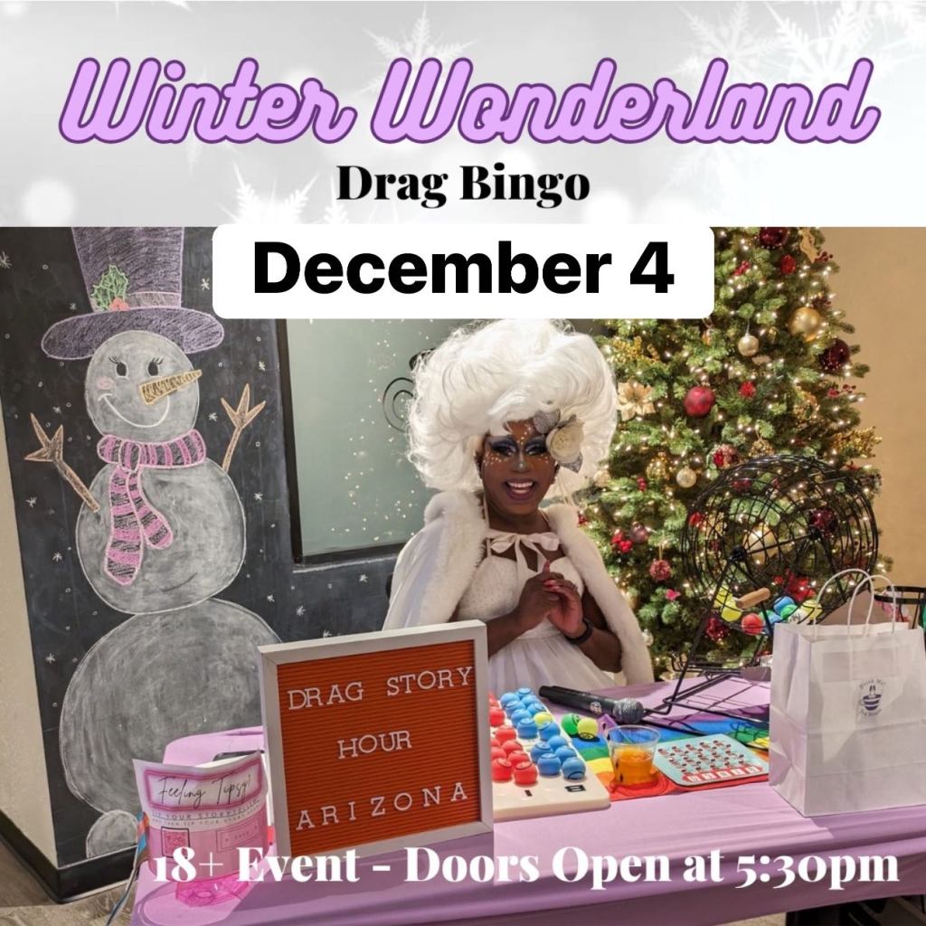 Felicia "Fefe" Minor in extravagant white wintery costume is sitting a table with her bingo set up at Drink Me! Tea Room in Tempe, AZ.